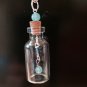 Beads in a cork bottle