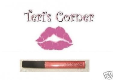Smashbox lip enhancing gloss in SAVVY  (coral pink)