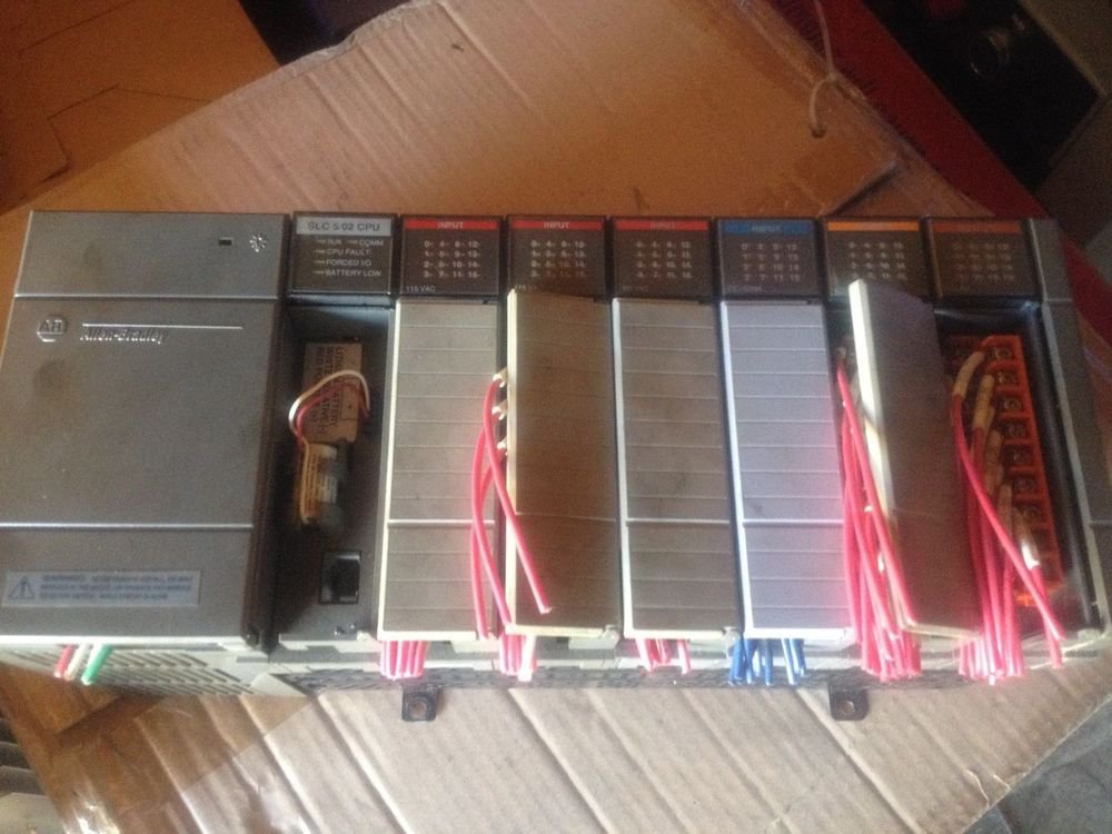 ALLEN-BRADLEY SLC 500 7-SLOT RACK #1746-A7 SER B FULL WITH CARDS