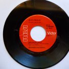 Elvis Presley, "Jaihouse Rock" / "Treat Me Nice"
