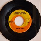 Bobby Darin, "I Wonder Who's Kissing Her Now"
