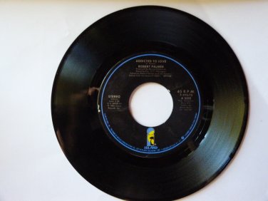 Robert Palmer, "Addicted To Love"