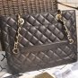 A50995 GST black lambskin with gold hardware