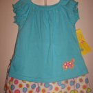 Baby girl size 12 months top and shorts / skirt set
