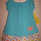 Baby girl size 18 months top and shorts / skirt set