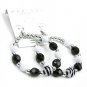 Medium hoop earrings with black, silver and zebra print beads
