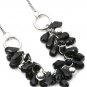 Silver chain necklace with cluster of black beads and earring set jewelry