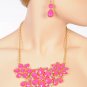 Chunky silver toned biib necklace & earrings with pink faceted stones KPN3538FSG