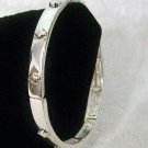 Stretch Silver Tone Bracelet With Fancy Cross Accents