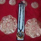 Black Cord Necklace with Circular Pendant