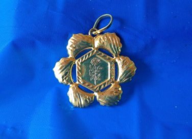 LARGE CUT METAL GOLD OVER STERLING SILVER PENDANT. PRETTY FLOWER DESIGN