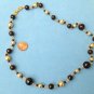 VINTAGE 24"  "NAPIER" BLACK & GOLD TONE NECKLACE. LARGEST BEAD IS 1/2" DIAMETER