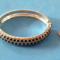 2 SIDED TEXTURED SILVER & BLACK ENAMEL HINGED BANGLE BRACELET .5"TH. 2" X 2.5"w