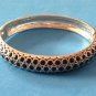 2 SIDED TEXTURED SILVER & BLACK ENAMEL HINGED BANGLE BRACELET .5"TH. 2" X 2.5"w