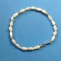 14 K AND FRESHWATER PEARLS 6 1/2" LONG STRAND BRACELET. VERY SWEET !