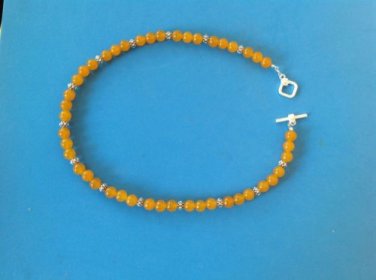 SILVER TOGGLE & TEXTURED & GOLDEN YELLOW BEAD NECKLACE. 19" LONG