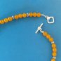 SILVER TOGGLE & TEXTURED & GOLDEN YELLOW BEAD NECKLACE. 19" LONG