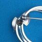 VINTAGE STERLING SILVER TRIPLE CIRCLE WITH BOW PIN. SIGNED "d e c "