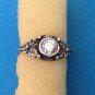 VINTAGE STERLING SILVER FLOWER DESIGN CLEAR STONE DAINTY RING SIZE 4.75 LOVELY !