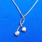 VINTAGE KREMENTZ GOLD TONE LARIAT DANGLING TWISTING HEARTS NECKLACE 16" LONG