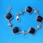 STERLING SILVER ONYX AND MARCASITE LINK BRACELET 7 1/2" LONG X 5/8" WIDE
