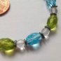 PRETTY FACETED BLUE GREEN CLEAR & SILVER TONE BEAD BRACELET 9" X 3/8" DIAMETER