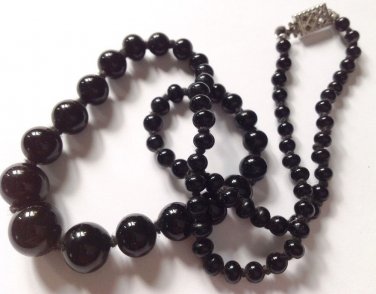 Necklace, graduated black bead - onyx? - knotted 16"  silver tone clasp.