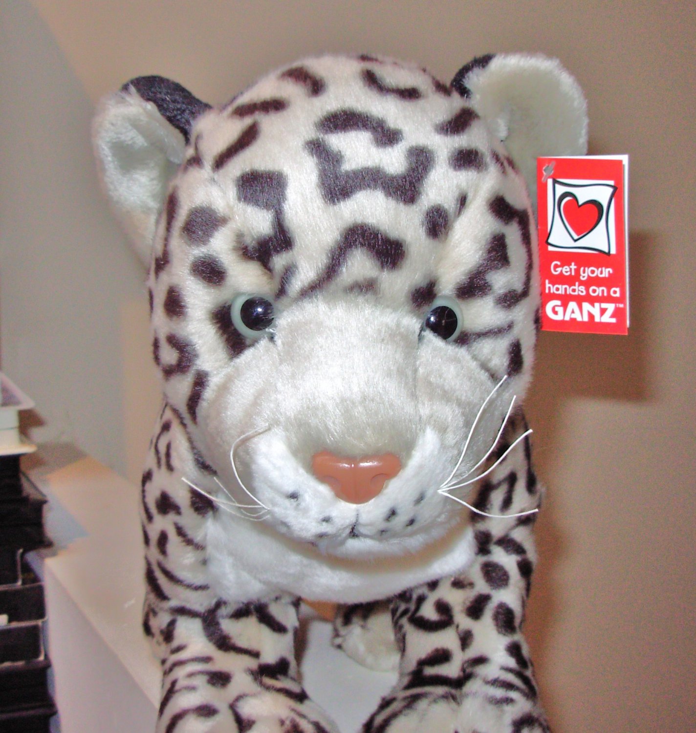 large stuffed snow leopard