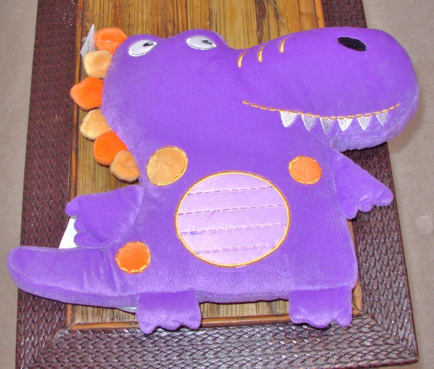 purple dinosaur pillow