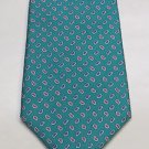 Christian Dior Designer Tie Blue Geometric Pattern on Teal Background