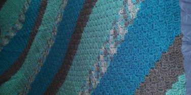 blue/gray striped throw