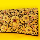 Embroideried floral motif, handbag with golden metallic wires