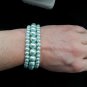Sea green pearl triple strand bracelet
