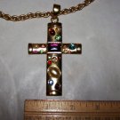 cross with multi colored stones and chain.