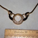 trifari necklace gold colored with clear stones very nice