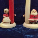 Claus candle huggers