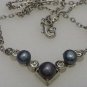 Pearl necklace black steel