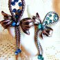 STERLING BOND BOYD BROOCH FANCY MOBILE BOWS 2XX