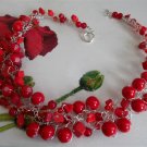 Red crochet wire necklace, coral red glass beads