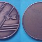 stylish Kawaski motorcycle medal, undated