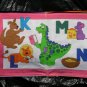 $20.50 Cloth Book 7X10-"Dexter The Dinosaur Learns All About Letters" 10 Pages-Machine Washable
