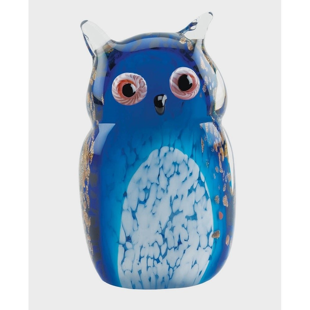 stuffed owl in glass dome