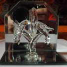 Glass dolphins figurine