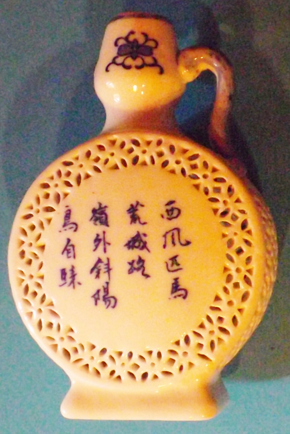 Small decorative porcelain bottle