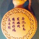 Small decorative porcelain bottle