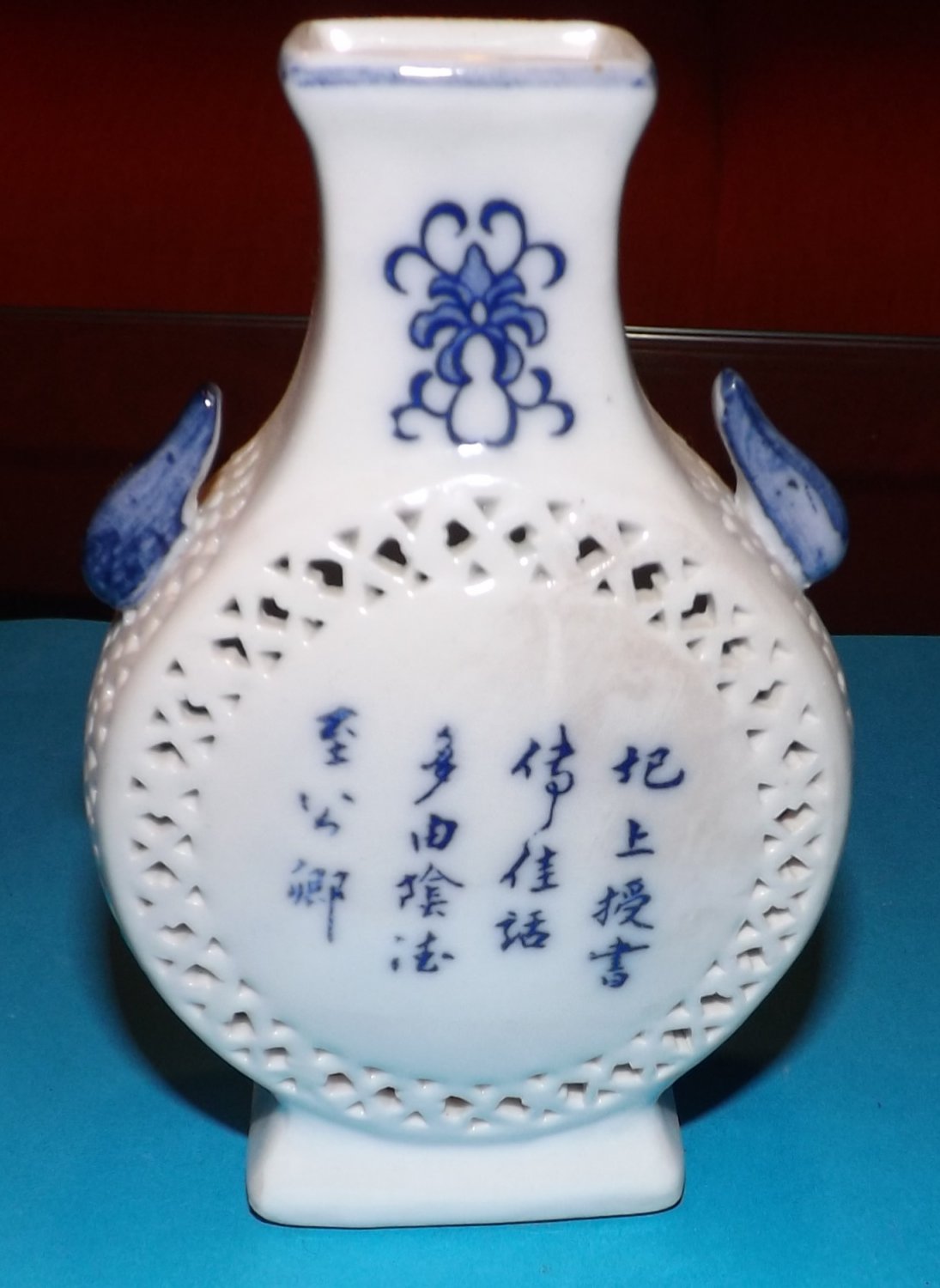 White and blue small porcelain vase