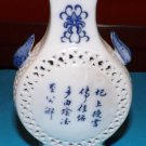 White and blue small porcelain vase