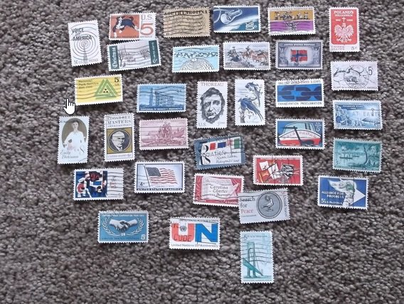 32 USA assorted used stamps.