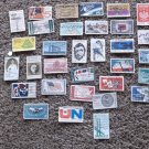 32 USA assorted used stamps.