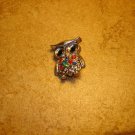 Cute silver metal button in shape of owl with colorful rhinestones.